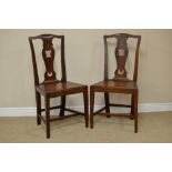 A Set of six 19th Century fruitwood Dining Chairs with unusual pierced splat backs, solid seats on