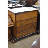 A 19th Century Gentleman's Campaign Dressing Chest with hinged box lid above three long drawers with