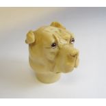 A 19th Century carved ivory Dog's Head Cane Top with inset glass eyes