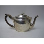 A George III silver oval Teapot engraved initial S within a floral cartouche, London 1801, makers: