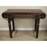A Chinese hongmu Altar Table, c.1900, with carved chain link frieze, the burr wood (huamu)