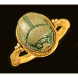 An Egyptian style Ring set faience Scarab, ring size L