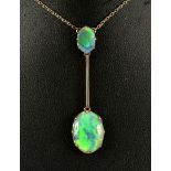 An Opal Necklace claw-set oval cabochon suspending knife blade bar terminating in larger cabochon on