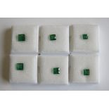 Six unmounted step-cut Emeralds, total weight approx 6.0cts