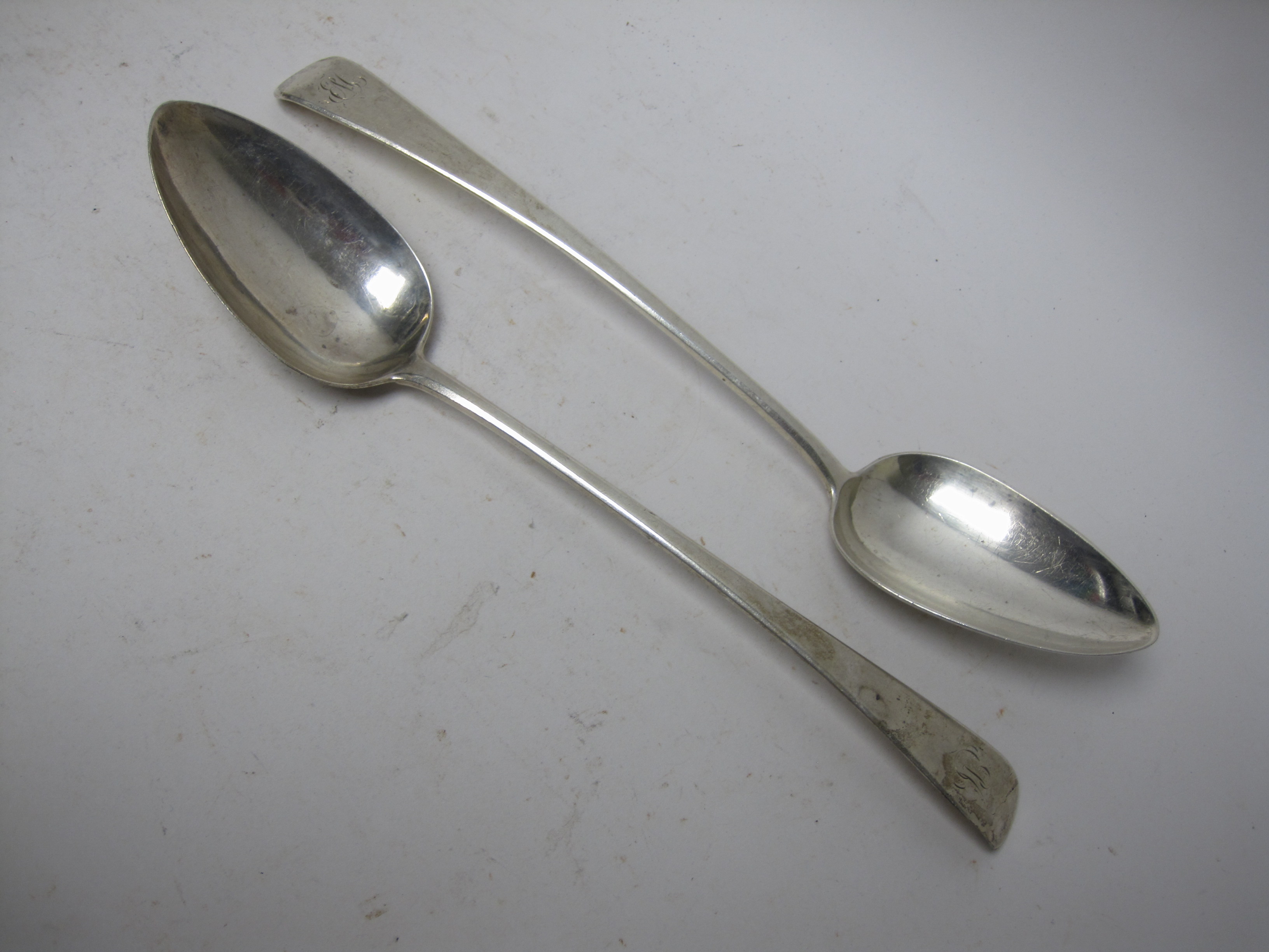 A pair of George III silver Basting Spoons, old english pattern engraved initials, London 1800