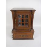 An Edwardian mahogany Games Compendium/Decanter Box with satinwood cross-banding having pair of