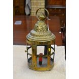 A 19th Century circular embossed Brass Hall Lantern with a dome top above a cut out section with a