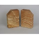 A pair of sandstone Bookends, 6 3/4in H. Formed by iron rich stream staining sandstone 220 million