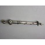 A Russian silver Torah Pointer of tapered form with coronet and pierced orb surmount, tapering shaft