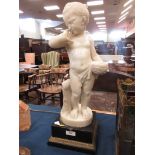 A 19th Century carved white marble Standing Child holding nest, on square ebonised base with gilt