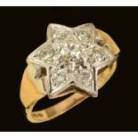 A Diamond Star Cluster Ring millegrain-set brilliant-cut stones in 9ct gold, ring size M 1/2