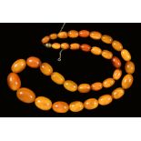 A graduated Amber Bead Necklace, approx 50gms