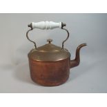 An Opaque Glass Handled Copper Kettle