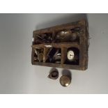 A 19th Century Box Containing Various Pocket Watch Movements,