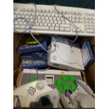 A Vintage Dreamcast Games Machine with Controllers,