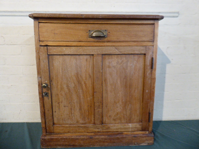 A Stripped Pine Side Cupboard with Top Drawer,