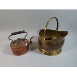 A Victorian Copper Kettle and A Brass Helmet Shaped Coal Scuttle