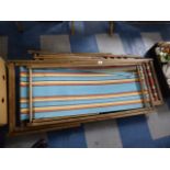 A Collection of Three Vintage Deck Chairs