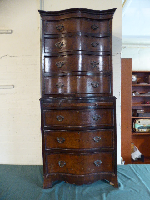 An Edwardian Cross Banded Walnut Serpentine Front Chest on Chest The Base Section with Brushing