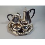 A Four Piece Silver Plated Tea Service and Octagonal Tray