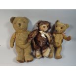A 20th Century Merrythought Plush Teddy Bear and Two Earlier Play Worn Examples