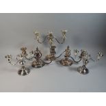 Two Pairs of Silver Plated Three Branch Candelabra and A Single Example