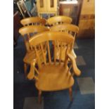 A Set of Four Plus One Pine Kitchen Chairs