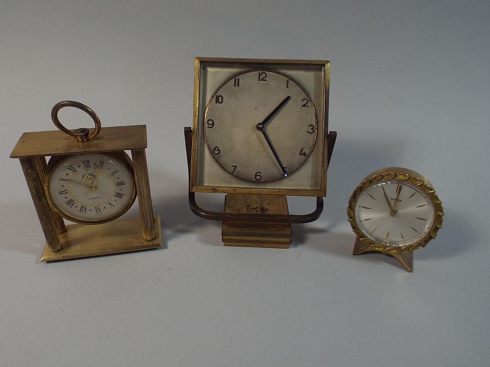 A Collection of Three Mid 20th Century Alarm Clocks by Swiza etc