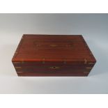 A Colonial Brass Inlaid Writing Slope with Fitted Interior,