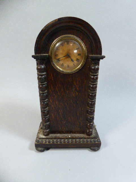 An Edwardian Oak Dome Top Mantle Clock,