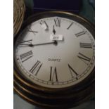 A Circular Wall Clock with Quartz Movement,