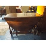 An Oak Barley Twist Drop Leaf Gate Leg Dining Table,