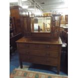 An Edwardian Walnut Dressing Chest with two Short and Two Long Drawers,