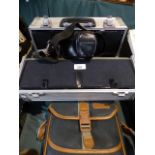 A Camera Case Containing Olympus 35 mm Camera,