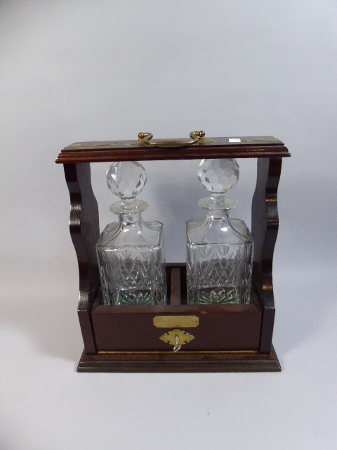 A Presentation Two Bottle Mahogany Tantalus with Brass Mounts, British Racing and Sports Car Club,