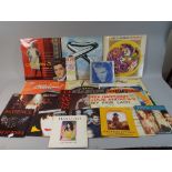 A Collection of 45 and 33 rpm Records to Include Elvis Presley, Mike Oldfield, ABBA,