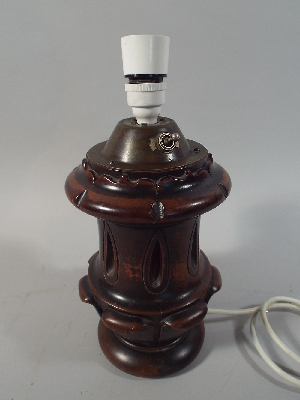 A Carved and Turned Wooden Table Lamp Base,