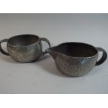 A Tudric Pewter Sugar Bowl and Matching Cream Jug