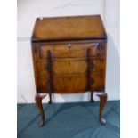 An Edwardian Walnut Serpentine Front Ladies Writing Bureau with Fall Front to Fitted Interior and