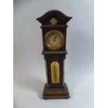 An Edwardian Oak Novelty Mantle Clock in the Form of a Long Case Clock, by XL,