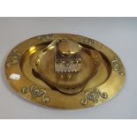 An Art Nouveau Brass and Glass Desk Top Ink Stand Together with an Art Nouveau Oval Brass Tray,