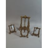 A Collection of Four Brass Photoframes,