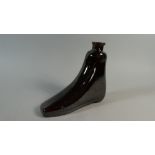 An Early 19th Century Treacle Glazed Pottery Shoe Flask.