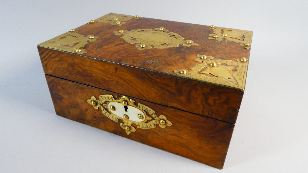 A Victorian Brass Mounted Walnut Workbox with Inner Removable Tray.