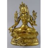 A Gilt Bronze Study of a Seated Buddha on Lotus Throne.