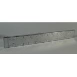 A Vintage Novelty Silver Plated Dunhill Lighter in the Form of a Ruler. 33.