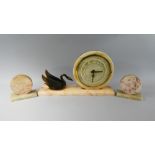 A French Art Deco Blonde Marble Clock Garniture with Swan Mount.