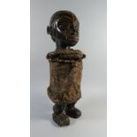 An Impressive Early 20th Century African Male Figure with Well Patinated Carved Detail.