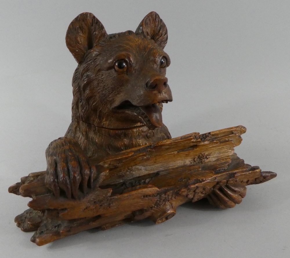 A Charming 19th Century Black Forest Inkwell and Pen Rest Carved as a Bear Holding Log.