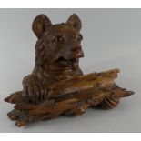 A Charming 19th Century Black Forest Inkwell and Pen Rest Carved as a Bear Holding Log.